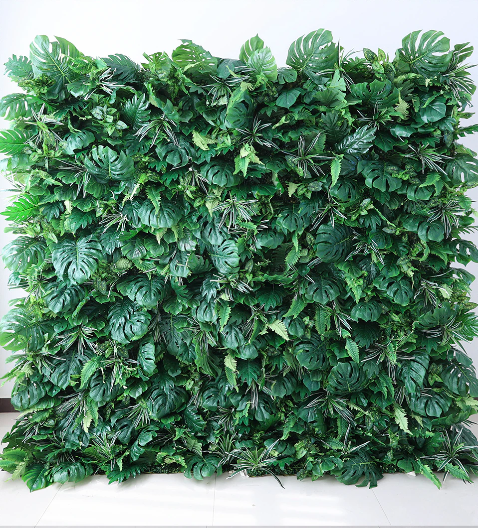 Branded floral step-and-repeat backdrop with company signage at a New York City press event