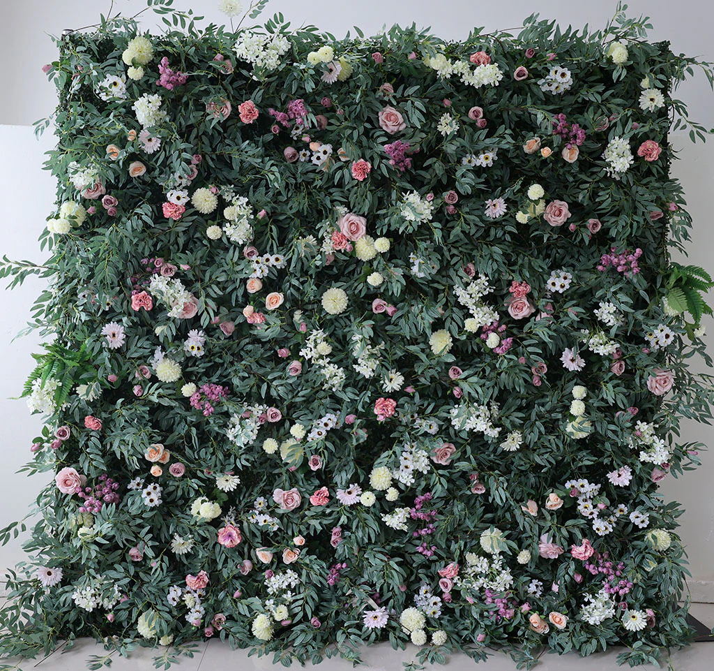 Earthy flower wall rental — greenery, yellow & pink floral backdrop for New York City events