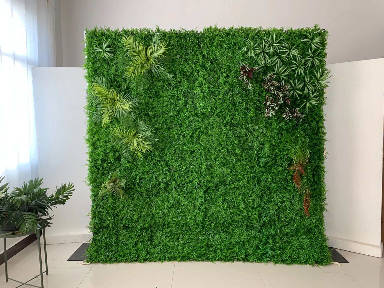 Green Machine flower wall rental — lush green floral backdrop for New York City events