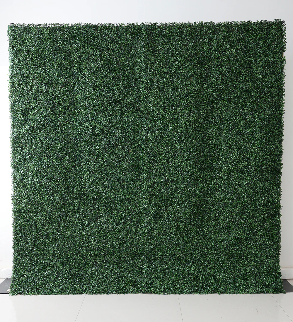 Greenstreak flower wall rental — boxwood green floral backdrop for New York City events