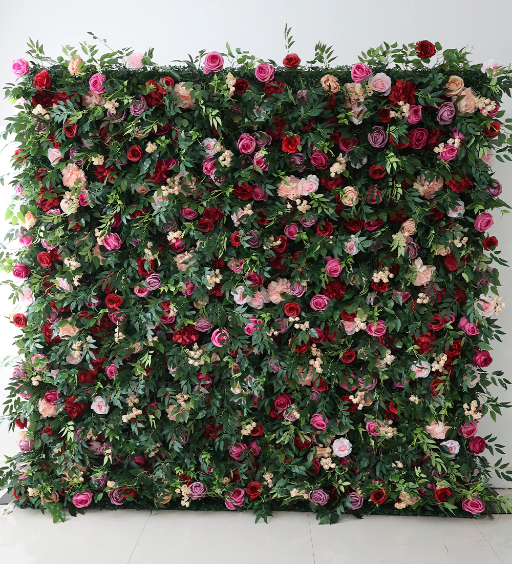 Monarch flower wall rental — red, pink & peach floral backdrop for New York City events