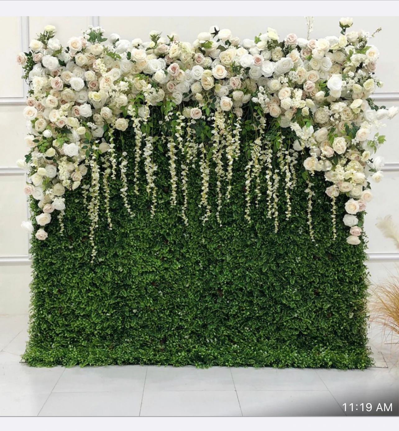 Paradise flower wall rental — white & greenery floral backdrop for New York City events