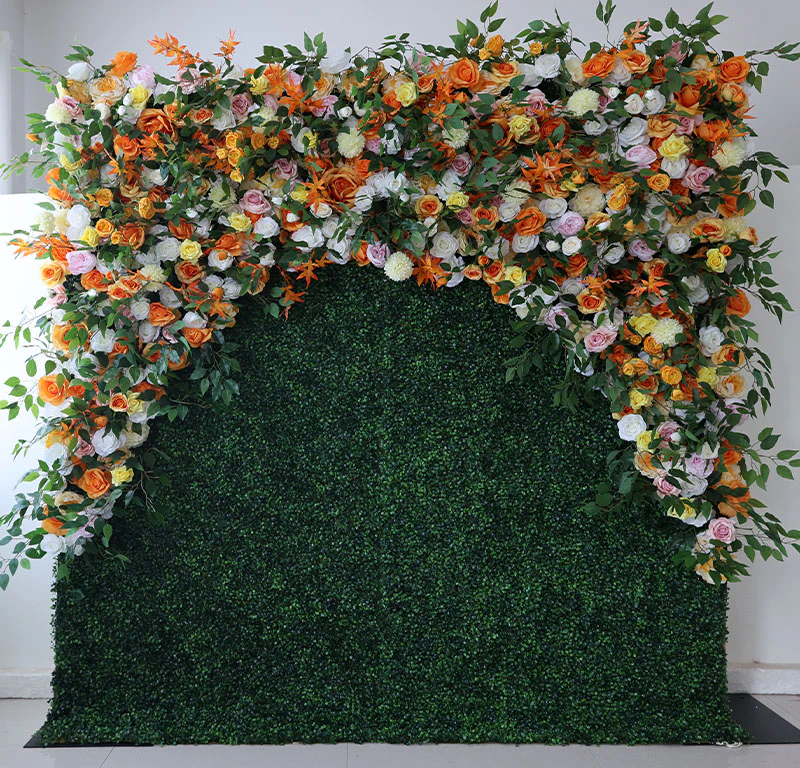 Sunrise flower wall rental — yellow, orange & pink floral backdrop for New York City events